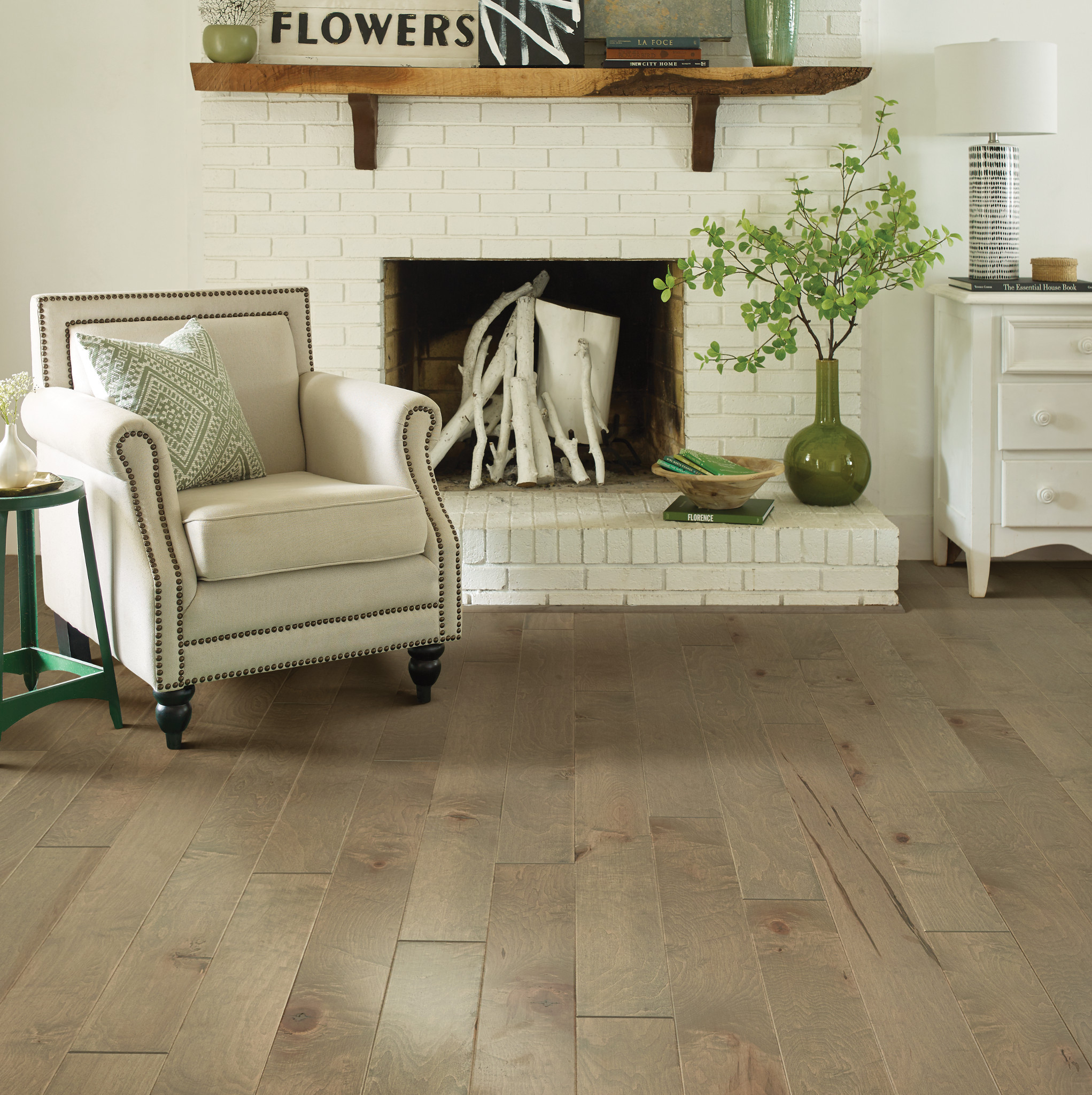 livingroom hardwood in livingroom with white fireplace mantle